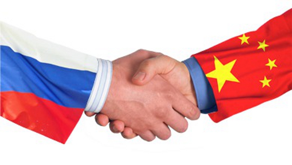 Кина нуди Русији заједничку борбу против монопола долара и обојених револуција